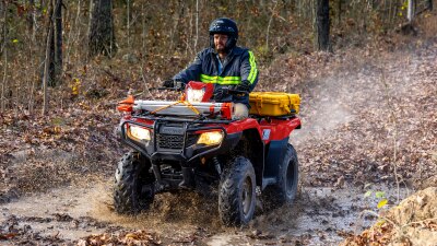 Drived on forman in muddy puddle. front facing. Slight right angle.