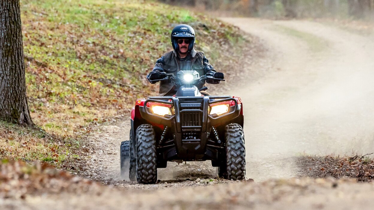 Front view of rider on Rubicon on road.