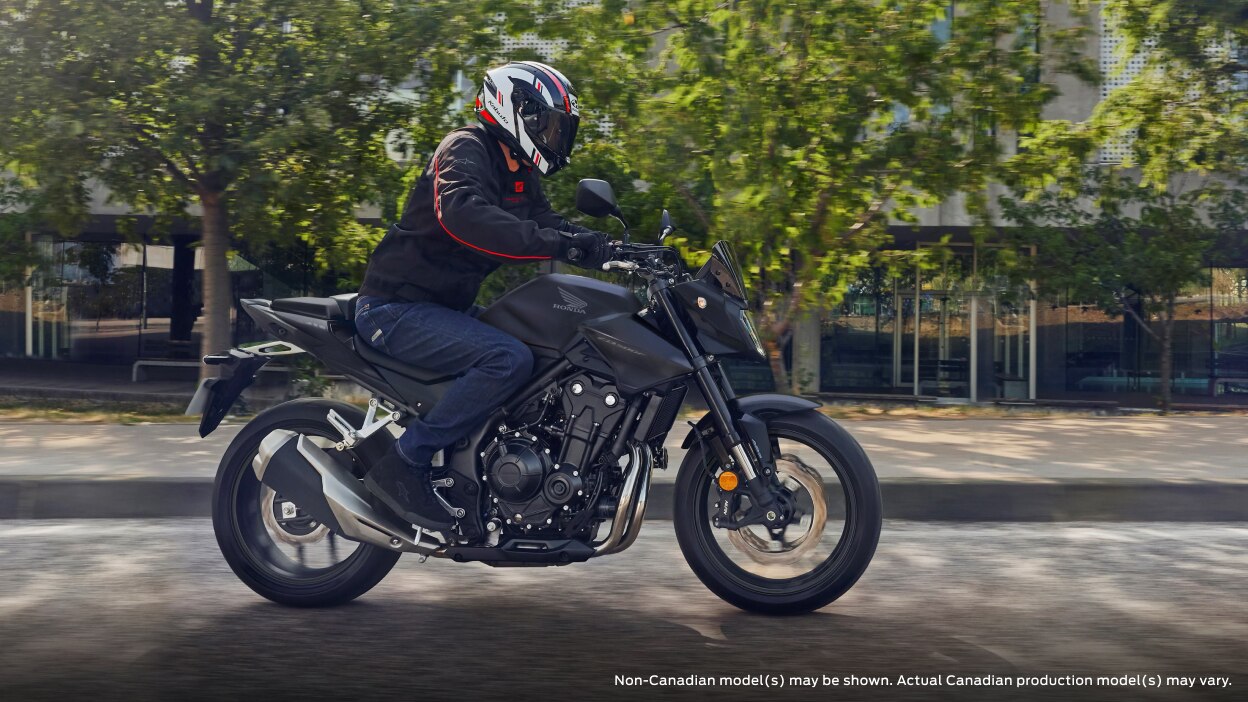 An rider on a CB500F, non Canadian model may be shown