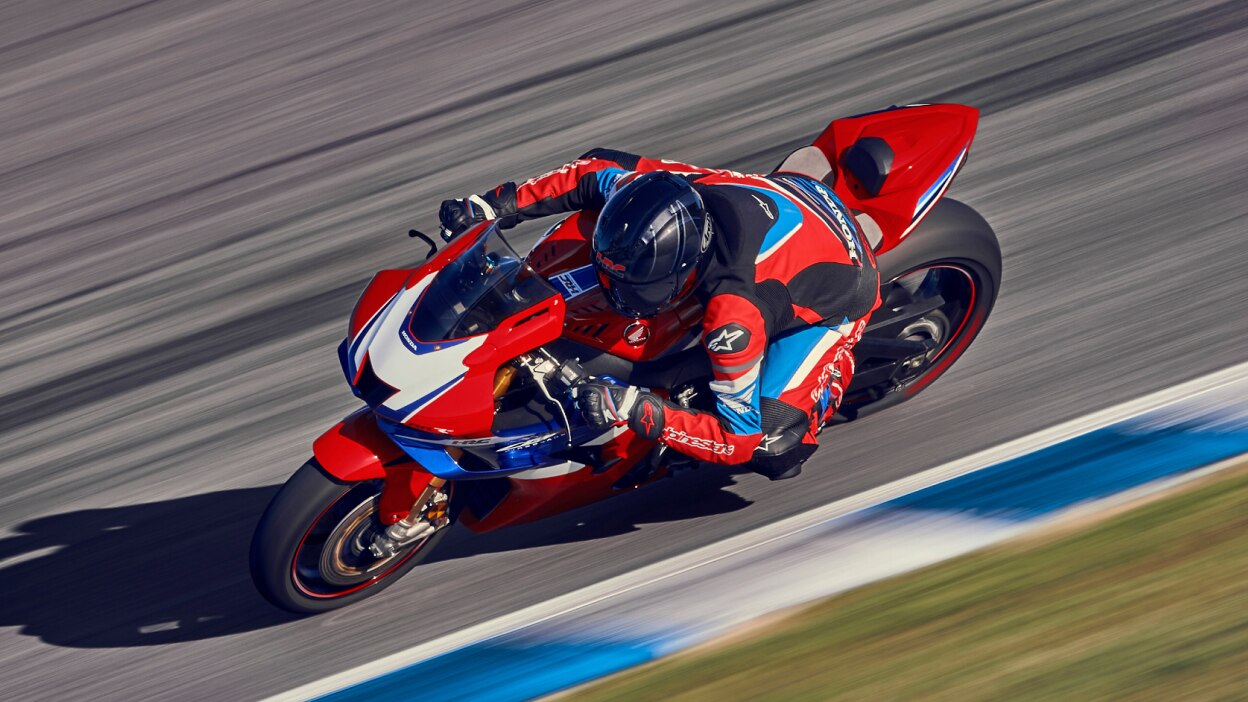 Birds eye view of rider on CBR1000RR-R Fireblade on race track.